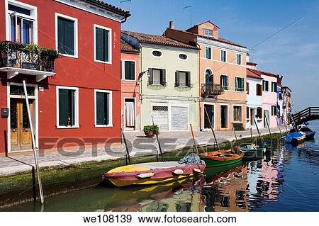 Colorfull that line the canals in Burano an island near Venice Italy View Large Photo Image Stock Photo - Colorfull that line the canals in Burano an island near Venice Italy. Fotosearch