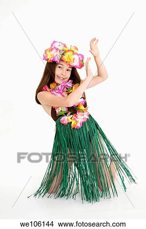 Eight year girl dressed in an Hula Dancers outfit on white background View Large Photo Image Picture - Eight year girl dressed in an Hula Dancers outfit on white background. Fotosearch