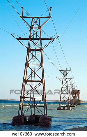 Electricity pylons anchored in the Red Sea near Al-Qusair, Egypt View Large Photo Image Stock Image - Electricity pylons anchored in the Red Sea near Al-Qusair, Egypt. Fotosearch