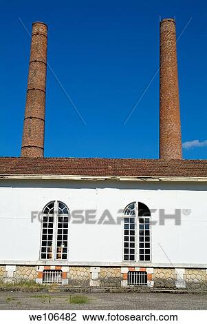 Factory with chimneys in Aquitaine, Bordeaux, France View Large Photo Image Stock Image - Factory with chimneys in Aquitaine, Bordeaux, France. Fotosearch