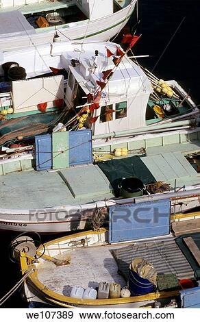 Stock Photo - Fishing boats moored side by side, Marseille, France. Fotosearch