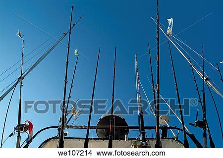 Fishing rods onboard a boat in the Mediterranean Sea, France View Large Photo Image Picture - Fishing rods onboard a boat in the Mediterranean Sea, France. Fotosearch