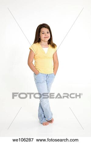 Five year old female child standing on white background smiling wearing casual clothes View Large Photo Image Stock Photo - Five year old female child standing on white background smiling wearing casual clothes. Fotosearch