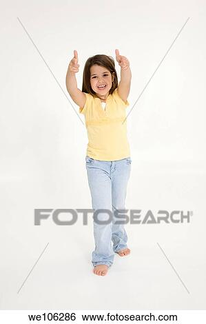 Five year old female child standing on white background smiling wearing casual clothes View Large Photo Image Stock Photograph - Five year old female child standing on white background smiling wearing casual clothes. Fotosearch