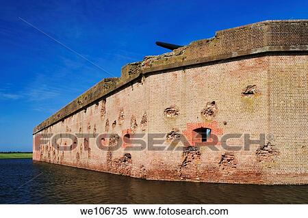 Fort Pulaski National Monument built 1829 to 1847 wall craters made by Union artillery, moat surrounds fort View Large Photo Image Stock Photography - Fort Pulaski National Monument built 1829 to 1847 wall craters made by Union artillery, moat surrounds fort. Fotosearch