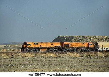 Freight train travelling through the desert, Jordan View Large Photo Image Stock Photo - Freight train travelling through the desert, Jordan. Fotosearch