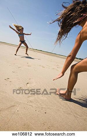 Girls Doing Cartwheels on Beach Cape Cod, Massachusetts Model Releases RF 09-08 RF 09-07 NO PR View Large Photo Image Stock Image - Girls Doing Cartwheels on Beach Cape Cod, Massachusetts Model Releases RF 09-08 RF 09-07 NO PR. Fotosearch