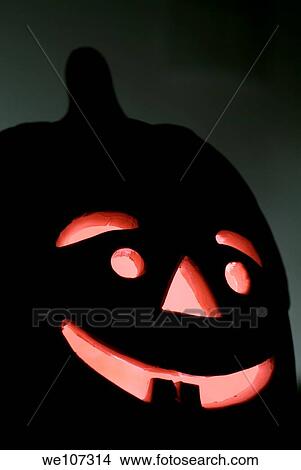 Picture - Halloween Jack o´ Lantern glowing at night. Fotosearch