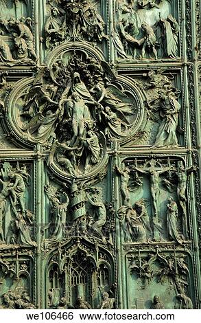 Stock Photograph - Intricate sculptures depicting the Crucifixion story on the Milan Cathedral, Milan, Italy. Fotosearch