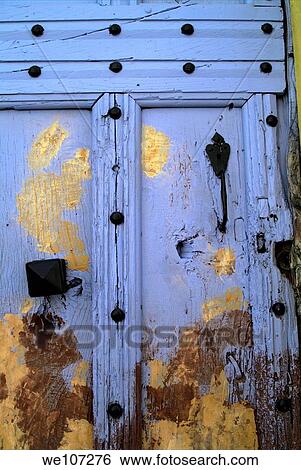 Medieval wooden door in run down condition, Olargues, Herault, France View Large Photo Image Stock Photograph - Medieval wooden door in run down condition, Olargues, Herault, France. Fotosearch