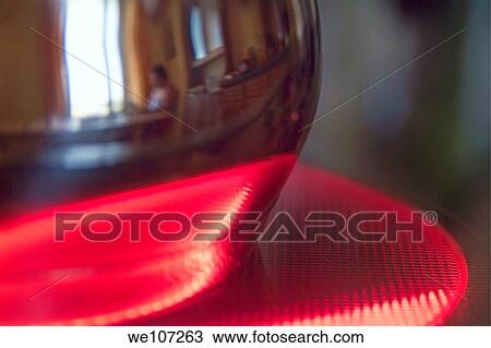 Metal pan heating up on a stovetop View Large Photo Image Stock Image - Metal pan heating up on a stovetop. Fotosearch
