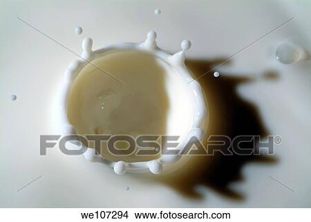 Milk splashing into the air View Large Photo Image Picture - Milk splashing into the air. Fotosearch