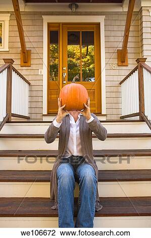 Moman with pumpkin View Large Photo Image Stock Image - Moman with pumpkin. Fotosearch