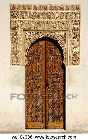 Ornate palace door in the Patio de los Arrayanes area of Alhambra, a 14th-century palace in Granada, Andalusia, Spain View Large Photo Image Stock Photograph - Ornate palace door in the Patio de los Arrayanes area of Alhambra, a 14th-century palace in Granada, Andalusia, Spain. Fotosearch