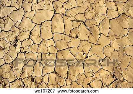 Stock Photo - Patterns in dry, cracked soil. Fotosearch