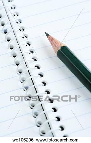 Stock Photograph - Pencil on notepad. Fotosearch