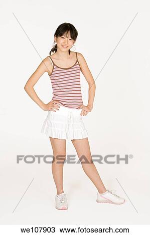 Portrait of a beautiful Asian teenager on a white background View Large Photo Image Stock Image - Portrait of a beautiful Asian teenager on a white background. Fotosearch