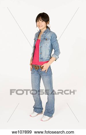 Portrait of a beautiful Asian teenager on a white background View Large Photo Image Stock Photo - Portrait of a beautiful Asian teenager on a white background. Fotosearch