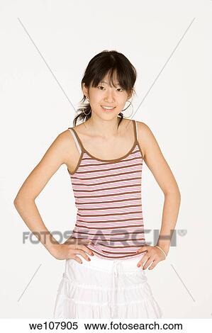 Portrait of a beautiful Asian teenager on a white background View Large Photo Image Stock Photography - Portrait of a beautiful Asian teenager on a white background. Fotosearch