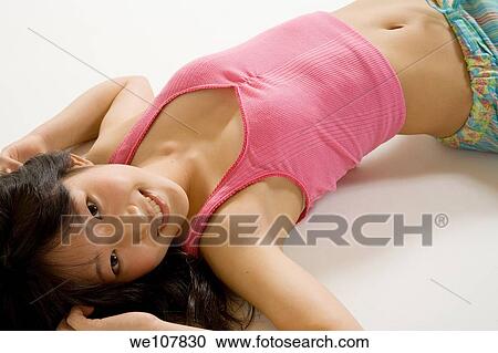 Stock Image - Portrait of a young asian teenager. Fotosearch
