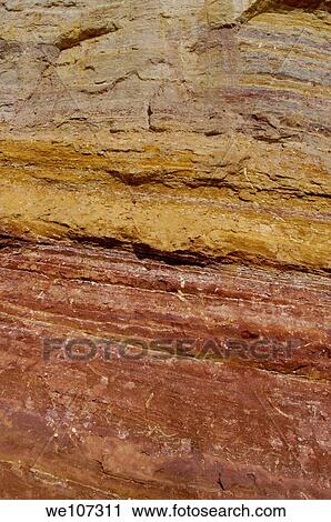 Red and yellow sandy rock face from a canyon in Rustrel, Luberon, Provence, France View Large Photo Image Stock Image - Red and yellow sandy rock face from a canyon in Rustrel, Luberon, Provence, France. Fotosearch