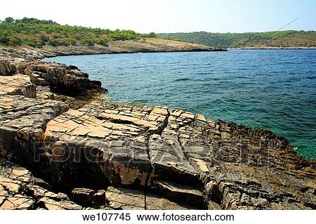 Rocky coast of Kabal Peninsula north of Stari Grad on Hvar Island, Croatia View Large Photo Image Stock Photography - Rocky coast of Kabal Peninsula north of Stari Grad on Hvar Island, Croatia. Fotosearch