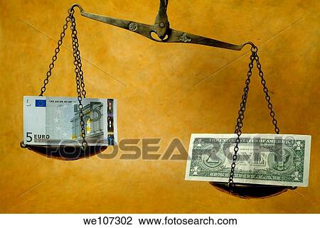 Stock Image - Scale weighing a five euro banknote and a one dollar banknote. Fotosearch
