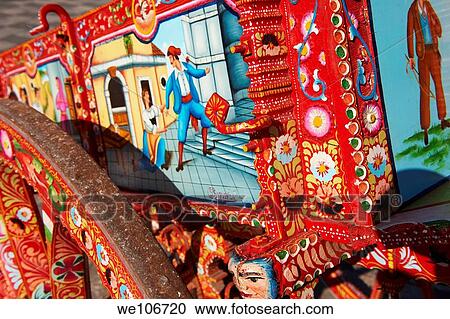 Sicilian folk art on a wooden cart View Large Photo Image Stock Image - Sicilian folk art on a wooden cart. Fotosearch