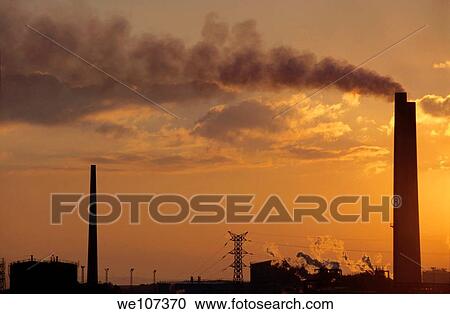 Silhouetted smoking chimney at sunset, Berre, France View Large Photo Image Stock Image - Silhouetted smoking chimney at sunset, Berre, France. Fotosearch