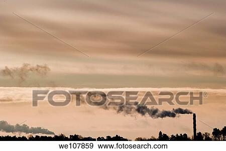 Stock Photo - Smokestacks and sky, Sweden. Fotosearch