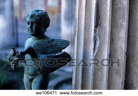 Statue of boy holding a bird in the Villa dei Vettri, Pompeii, Italy View Large Photo Image Stock Image - Statue of boy holding a bird in the Villa dei Vettri, Pompeii, Italy. Fotosearch