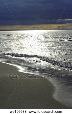 Sunset over Baltic Sea in Katy Rybackie village, Poland View Large Photo Image Stock Photo - Sunset over Baltic Sea in Katy Rybackie village, Poland. Fotosearch