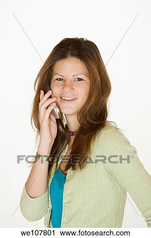 Teen talking on the cell phone View Large Photo Image Stock Image - Teen talking on the cell phone. Fotosearch