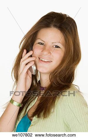 Teen talking on the cell phone View Large Photo Image Stock Image - Teen talking on the cell phone. Fotosearch