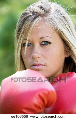 Teenage girl in boxing gloves View Large Photo Image Stock Photograph - Teenage girl in boxing gloves. Fotosearch