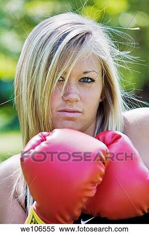 Stock Photography - Teenage girl in boxing gloves. Fotosearch