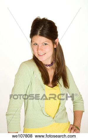 Stock Photo - Teenage girl posing on a white background. Fotosearch