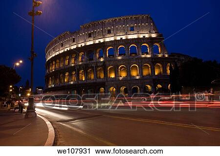 The Colosseum at night in Rome Italy View Large Photo Image Stock Image - The Colosseum at night in Rome Italy. Fotosearch