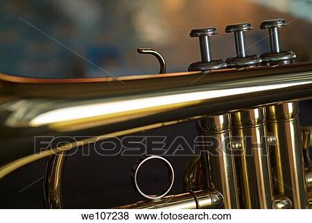 Three musical keys on a shiny trumpet View Large Photo Image Stock Photo - Three musical keys on a shiny trumpet. Fotosearch