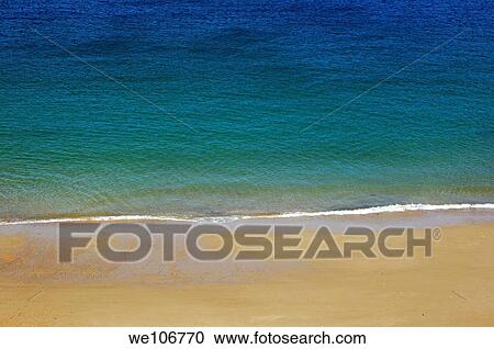 Transparent sea washing up onto a white sand beach View Large Photo Image Stock Image - Transparent sea washing up onto a white sand beach. Fotosearch