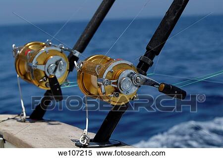 Two rod and reels on board a game fishing boat in the Mediterranean Sea, France View Large Photo Image Stock Photography - Two rod and reels on board a game fishing boat in the Mediterranean Sea, France. Fotosearch