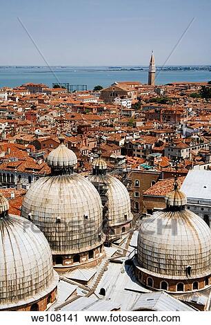 Venice rooftops with the domes of Basilica San Marco in the foreground Venice Italy View Large Photo Image Stock Image - Venice rooftops with the domes of Basilica San Marco in the foreground Venice Italy. Fotosearch