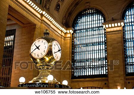 Stock Photography - View of the clock and windows in Grand Central Terminal, New York City.. Fotosearch