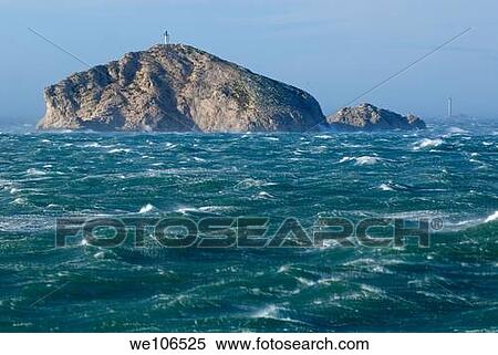 Waves crashing against Tiboulen de Maire Island on a windy day, Marseille, France View Large Photo Image Stock Photography - Waves crashing against Tiboulen de Maire Island on a windy day, Marseille, France. Fotosearch