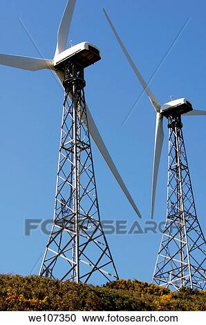 Wind turbines against blue sky, Tarifa, Andalusia, Spain View Large Photo Image Stock Image - Wind turbines against blue sky, Tarifa, Andalusia, Spain. Fotosearch