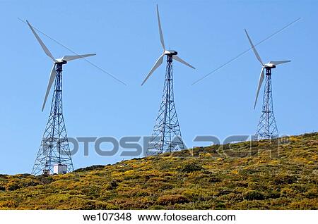 Wind turbines against blue sky, Tarifa, Andalusia, Spain View Large Photo Image Stock Photo - Wind turbines against blue sky, Tarifa, Andalusia, Spain. Fotosearch