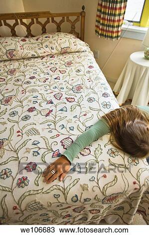 Stock Image - Woman on Bed. Fotosearch
