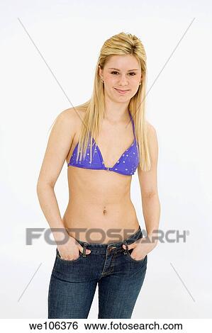 Woman posing in a swimsuit with some attitude View Large Photo Image Stock Photograph - Woman posing in a swimsuit with some attitude. Fotosearch