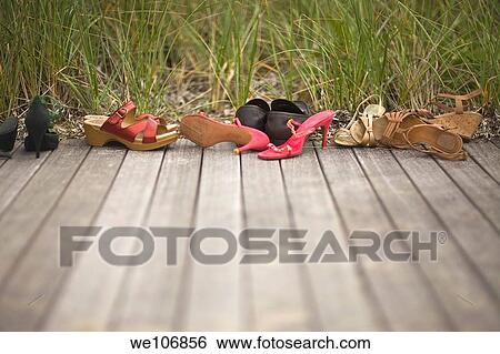 Woman´s shoes on Boardwalk Nantucket, Massachusetts NO MR NO PR View Large Photo Image Stock Photograph - Woman´s shoes on Boardwalk Nantucket, Massachusetts NO MR NO PR. Fotosearch