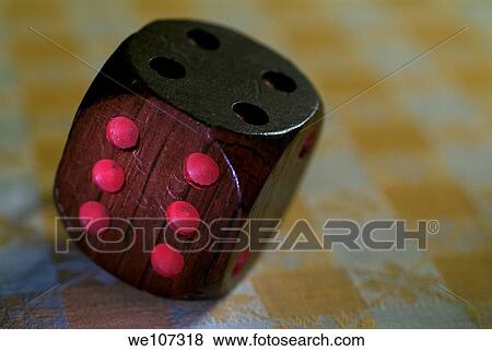 Wooden dice with pink spots on a table View Large Photo Image Stock Photo - Wooden dice with pink spots on a table. Fotosearch
